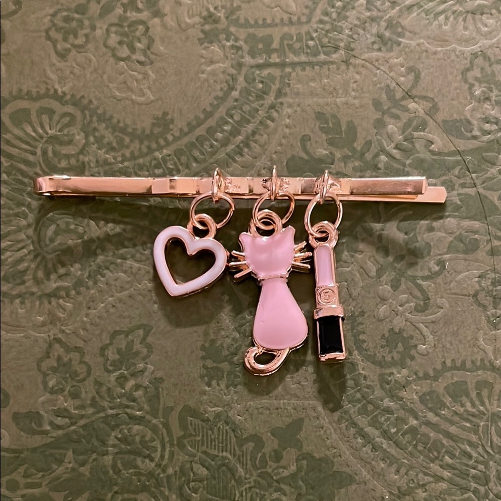 Charming Gold Hair Clip with Pink and Black Charms